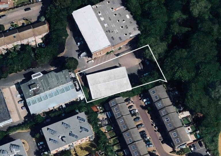 Income-producing building sold unconditionally
