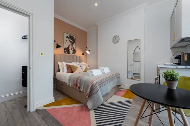 Unbroken freehold building comprising 7 serviced apartments in Notting Hill