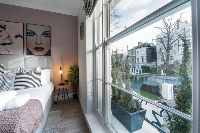 Unbroken freehold building comprising 7 serviced apartments in Notting Hill