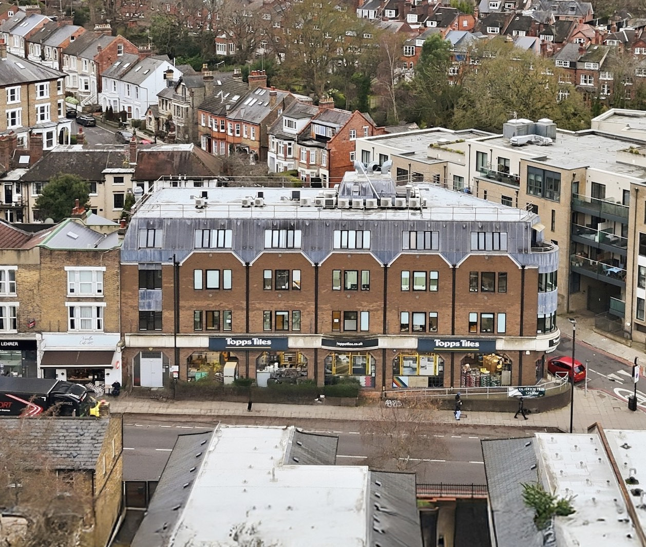 Income-producing mixed-use building with potential for residential development in Highgate
